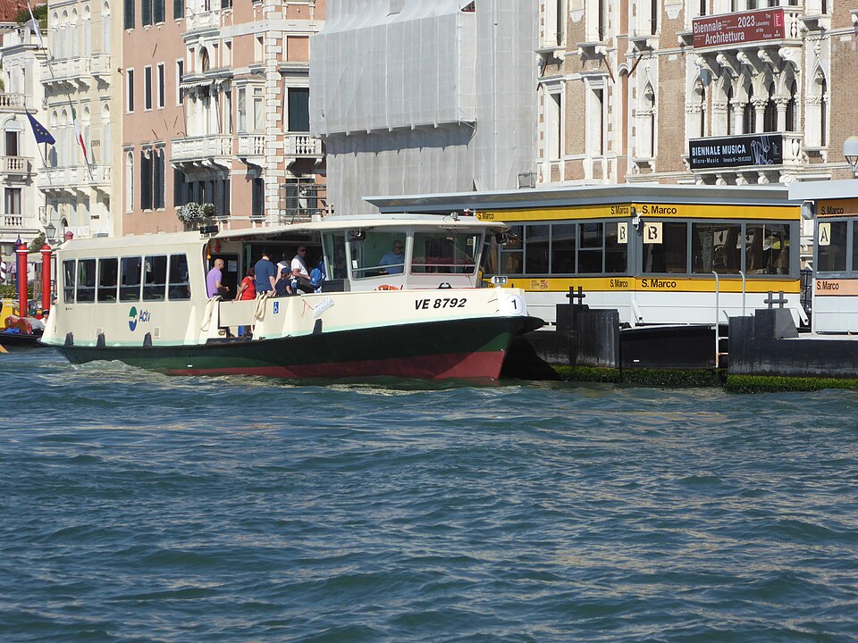 An ACTV vaporetto carrying passengers on the water in Venice